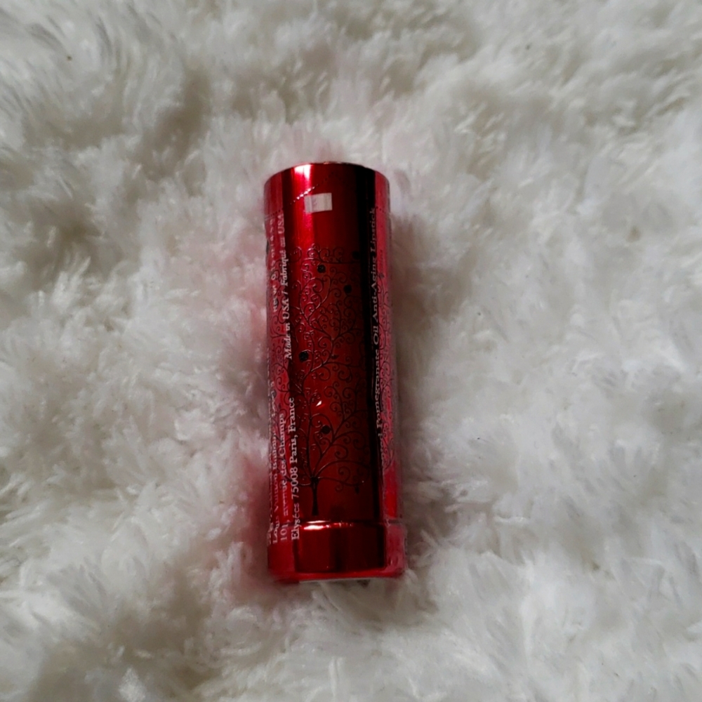 100% PURE ROSE GOLD LIPSTICK. New and completely sealed.